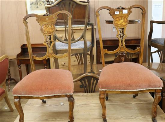 A pair of Edwardian inlaid mahogany boudoir chairs